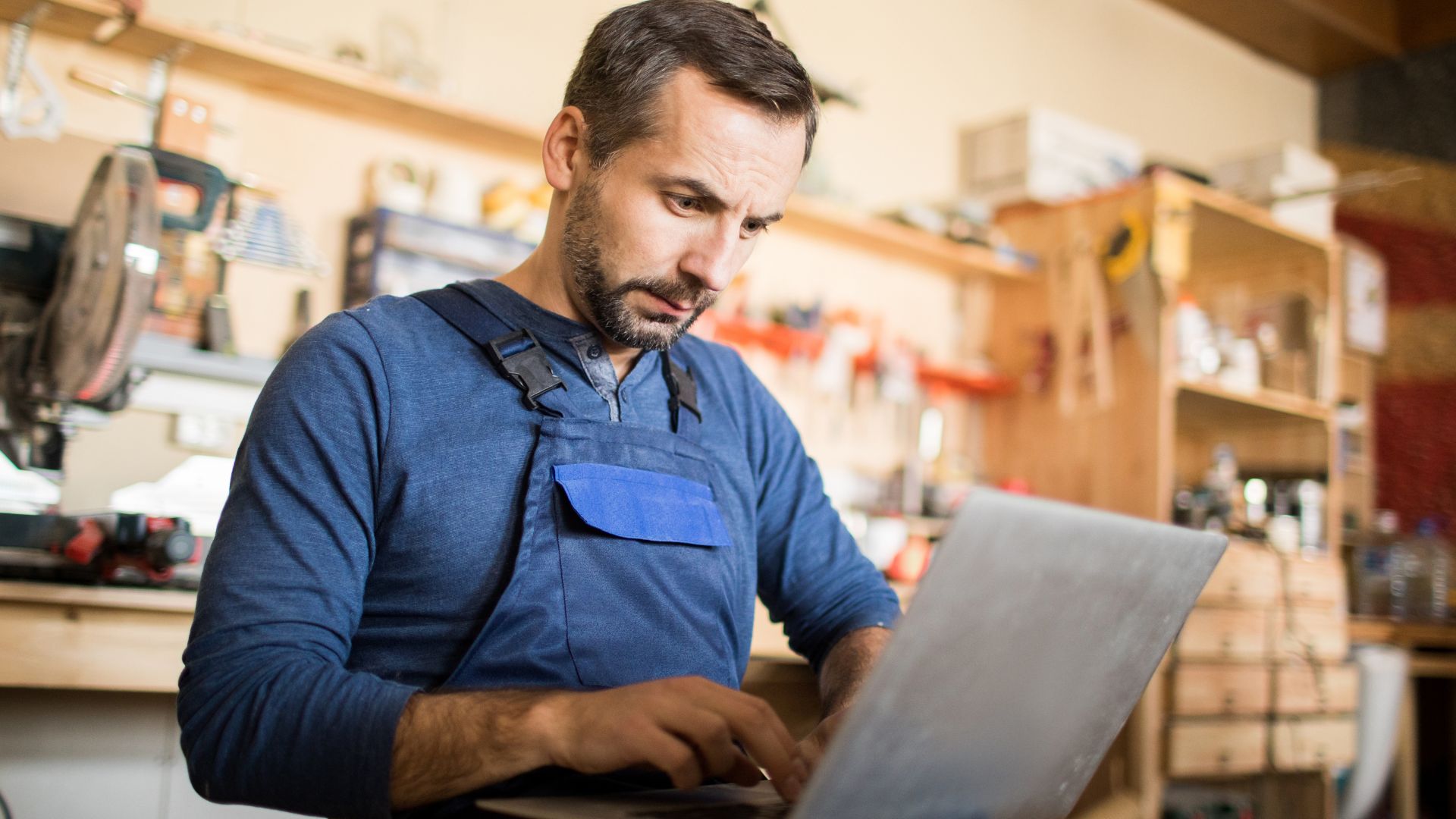 Small business owner implementing AI technology