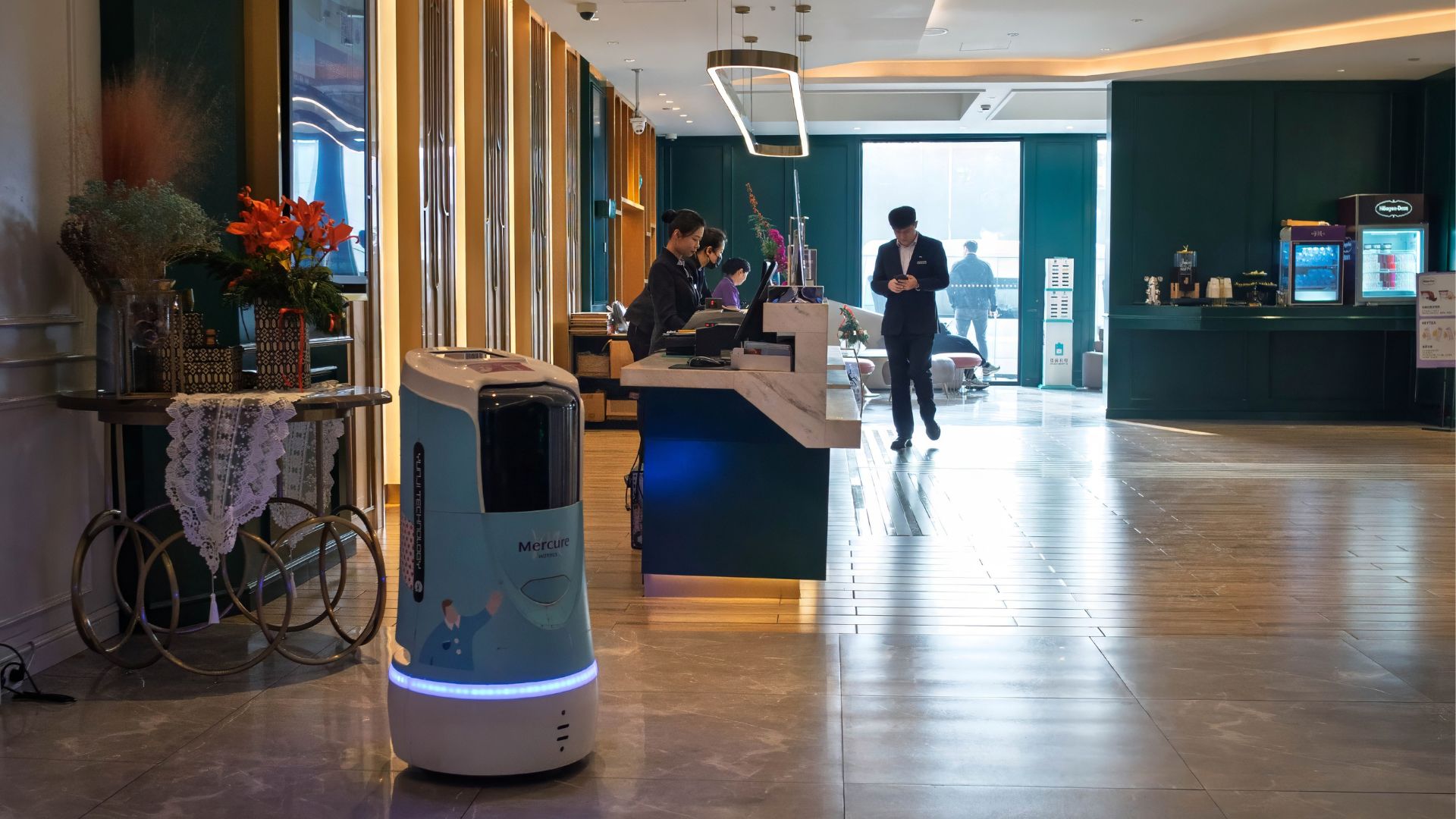 Hotel delivery robot in hallway