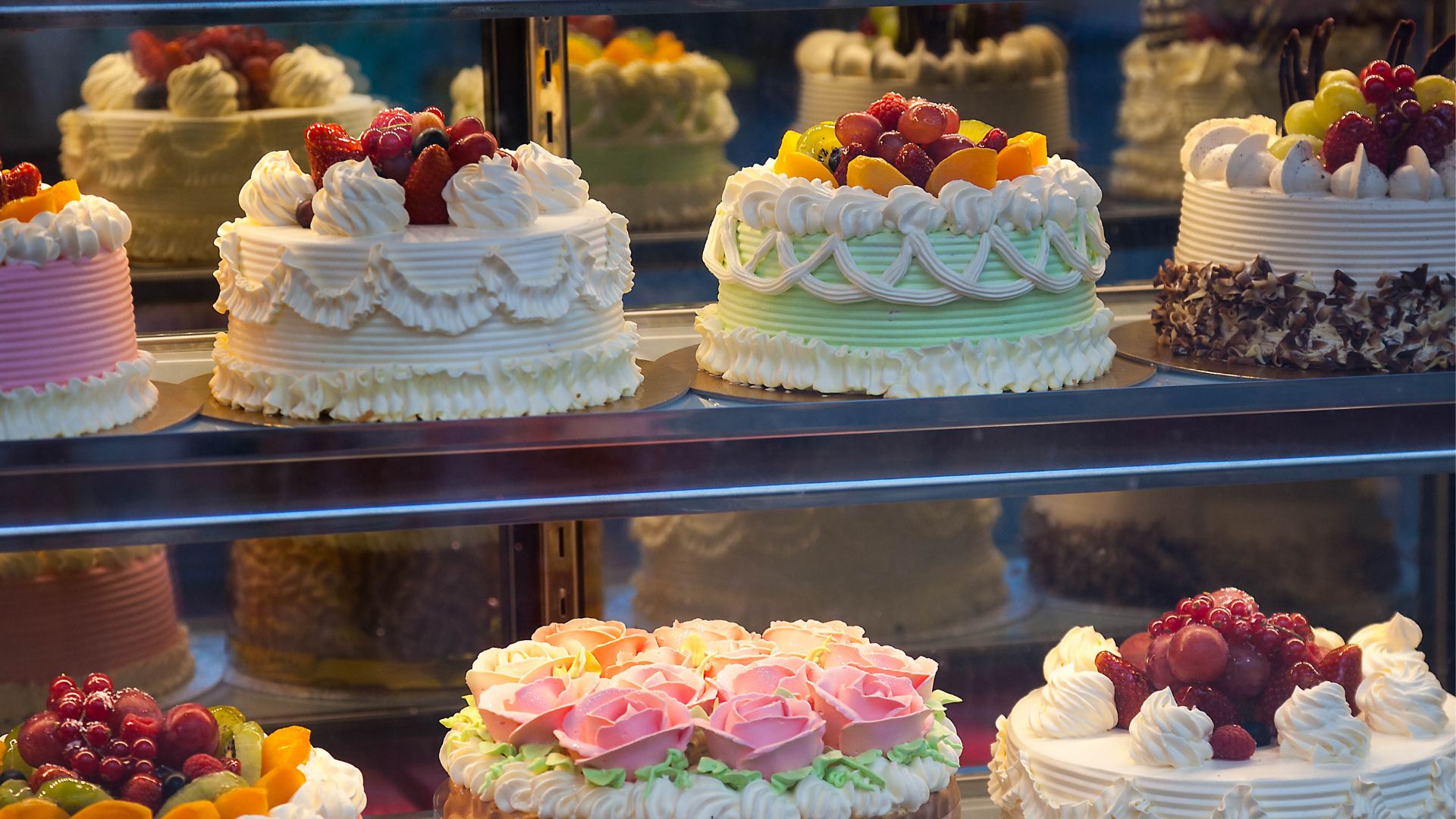 Bakery owner taking custom cake order on tablet